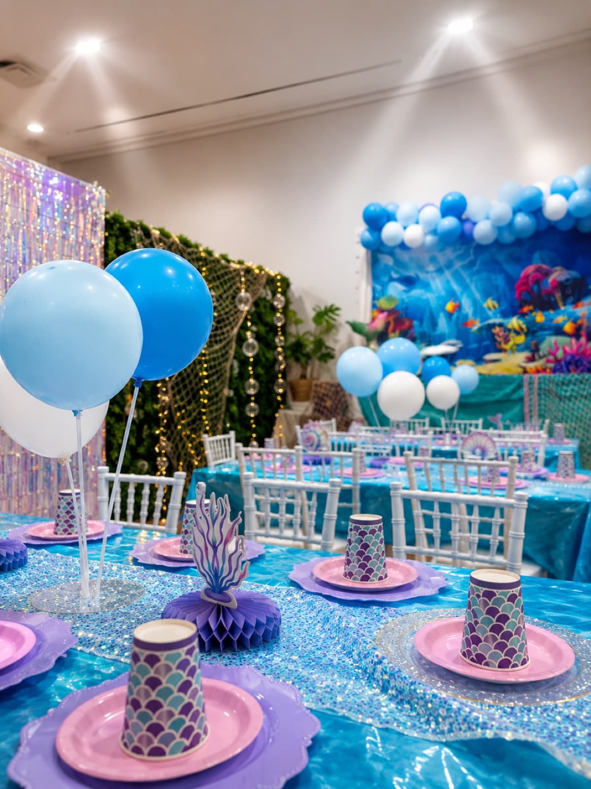 A styled under-the-sea birthday party tablescape at Pikopye's Town